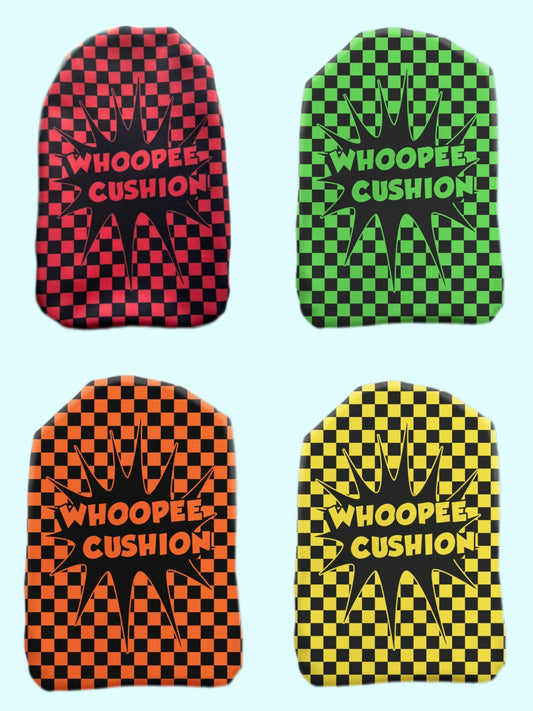 Four vibrant Whoopie Cushion Stoma Bag Covers in red, orange, green, and yellow, designed for ostomates with a sense of humour.