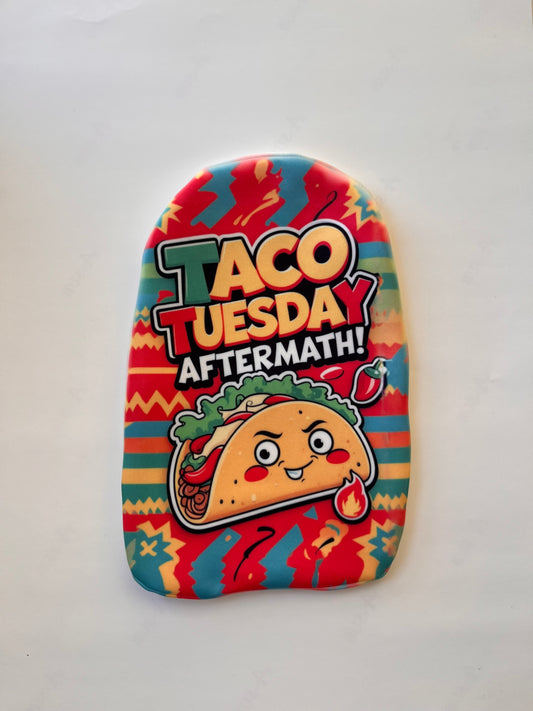 Red and yellow humorous stoma pouch cover featuring taco graphics – funny ostomy accessory for post-meal laughs.